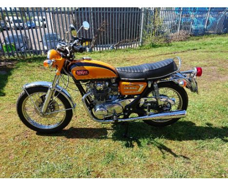 A 1971 Yamaha XS650, registration number FMW 548J, frame number S650-106420, engine number S650-106420, orange and black.  Th