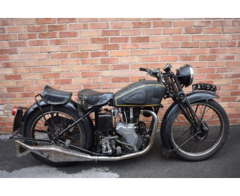 A 1939 Velocette MSS, registration number FXU 52, engine number MSS3944, black.  The MSS was the third in the M series introd