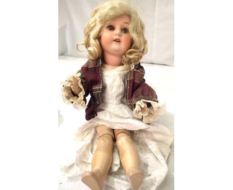 Hevbach Koppelsdorf Germany ceramic doll, with sleep eyes and jointed legs and arms. Marked to back of head, 312 SUR 3/0, H: 