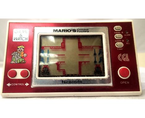 Nintendo game and watch, Marios Cement Factory 1983, no 18198351, clean battery compartment, loose front facia, untested. P&a