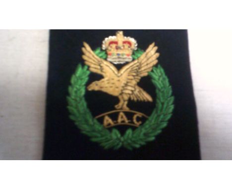 British Army Air Corps Cloth Arm or Blazer patch, excellent large insignia with QC and gold braid eagle surrounded by a laure