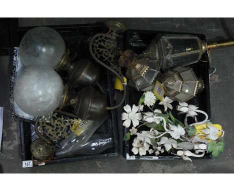 A collection of light fittings including a pair of wall mounted single branch oil lamps, a coaching lamp and lanterns, togeth