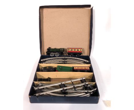 A Hornby O Gauge Passenger Set No.21, clockwork engine, tender, carriages and track, boxed