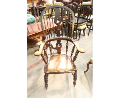 A 19th century smoker's bow armchair, with dished seat, 114cm high