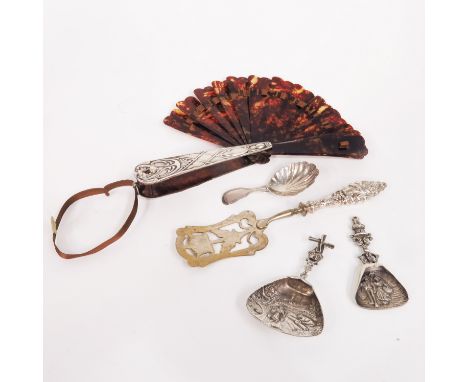 A collection of silver including Dutch caddy spoons, George III caddy spoon, tortoiseshell effect fan etc