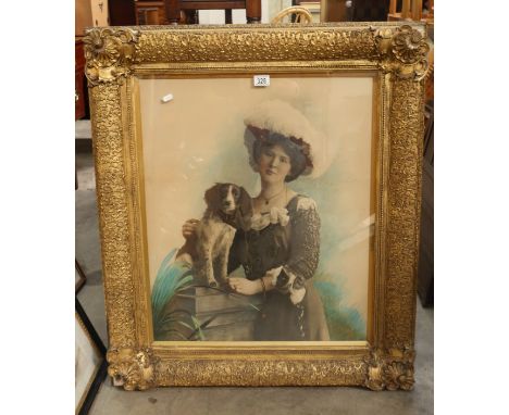 A late Victorian photogravure portrait of a lady and pet dog, 70 by 60cm, in the original gilt frame, together with two wall 