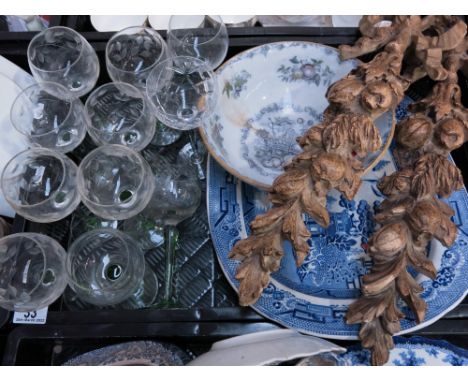 Ceramics and glass including cut glass wine glasses, a blue and white willow pattern platter and a pair of simulated carved w