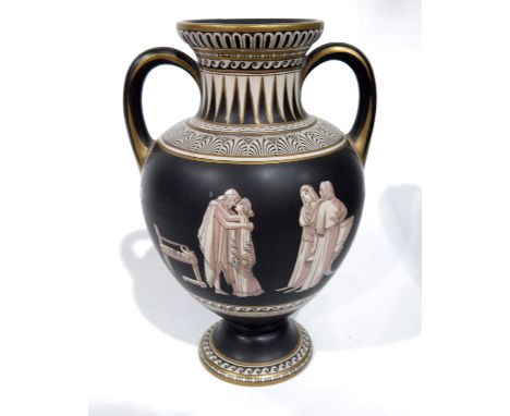 A Prattware twin handled pedestal vase, Etruscan style with classical figures and geometric banding, 23cm high