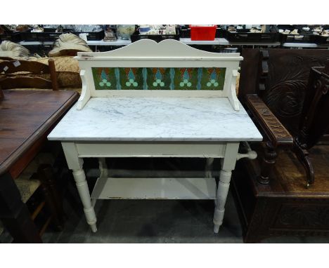 A late Victorian marble topped wash stand, with tile back, width 92cm