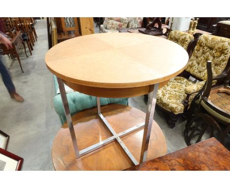 An Art Deco style occasional table, circular birdeye maple quarter veneered top, chrome base, 70cm wide