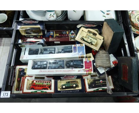 A collection of model vans, buses and trucks
