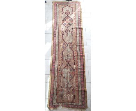 An antique Persian Sarab runner with camel ground, 365 by 106cm