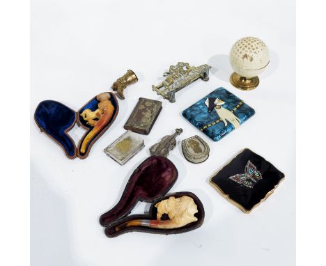 Two Meerschaum carved pipes with amber tips, a Stratton enamelled and marcasite set compact, novelty gold ball lighter, etc