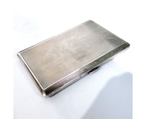 A George VI silver cigarette case, engine turned, 13 x 8 cm