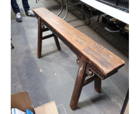 A rustic Oriental wooden bench, on A-frame legs, width 115cm