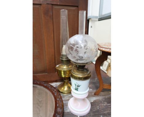 A Victorian opaque glass oil lamp, and a brass example (2)