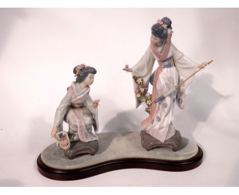 Lladro Figurine Geisha Girl Teruko Model 1451, together with Geisha girl picking flowers, on plinth base  (2)