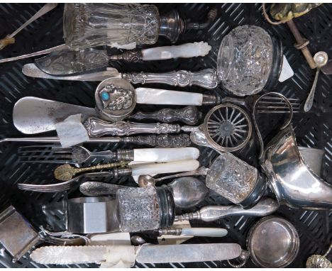 A collection of silver, plate and metal ware, to include a pair of silver mounted cut glass dressing table pots, a larger exa