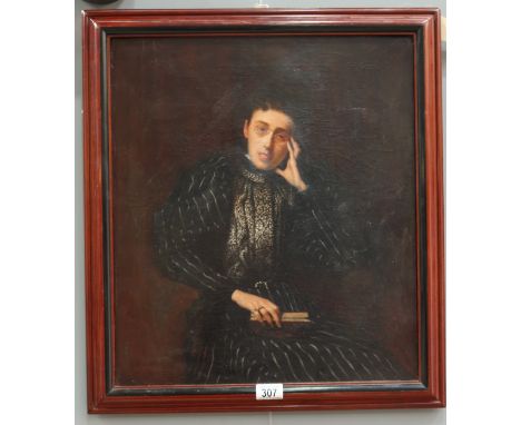 T.F.M.S. (British, late 19th Century), portrait of a lady holding a book, signed with initials and dated l.l., oil on canvas,