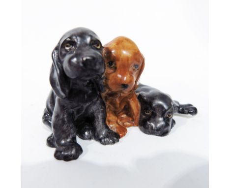 Doris Lindner for Royal Worcester 'Spaniel Puppies', circa 1950, shape No. 3130