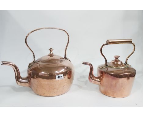 A large raised copper kettle, stamped on handle I.CMA Man, and another (2)
