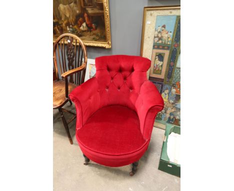 A late Victorian tub chair, with red button velvet upholstery