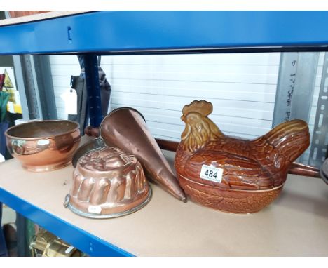 A collection of metalware including jelly moulds, conical jug, together with chicken dish and goose planter etc (6)