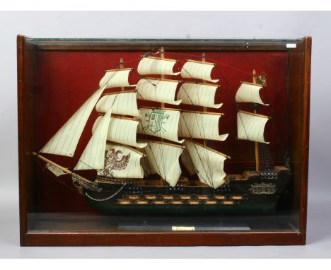 A cased wooden model of a rigged ship 'Fragata XVII'.