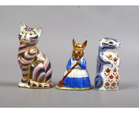 Two Royal Crown Derby paperweights, seated cat with gold stopper and beaver with silver stopper together with a Royal Doulon 