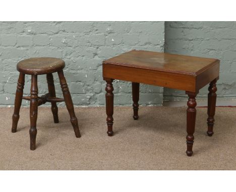 A Victorian mahogany commode raised over turned and fluted supports together with a Victorian ash kitchen stool.