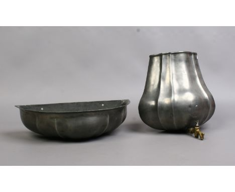 A C19th French pewter wall fountain font with brass tap and a pewter basin, touch marks to both.