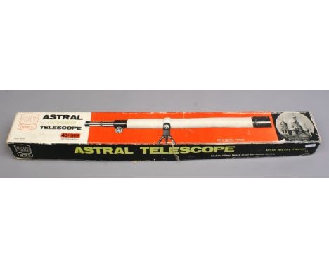 A vintage boxed Astral telescope and tripod by Prinz Optics.
