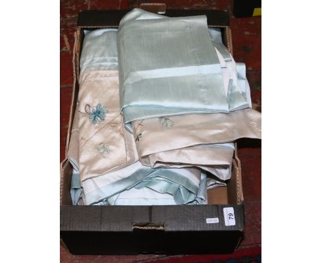 A box of matching curtains and ties.