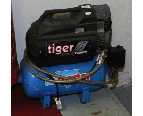 Please note that this lot is subject to VAT on the hammer price. An Air Master air compressor model No 5/12K Turbo