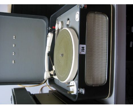 AN Early 1960's Bush Record Player, type SRP30C, with a Garrard 4SPHF Model Turntable, with installation/operating instructio
