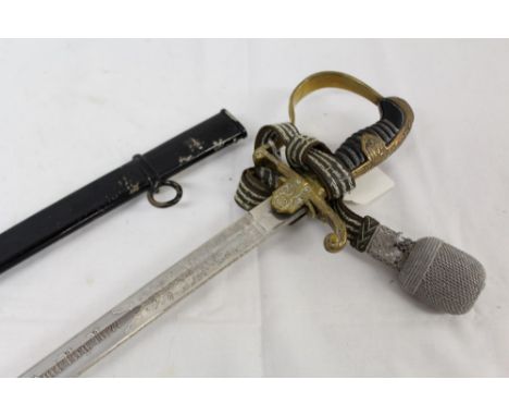 Nazi Army Officers' dress sword with gilt brass stirrup hilt with oak leaf decoration and eagle and swastika langets, etched 