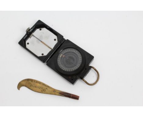 First World War brass trench art paper knife, marked on blade - 'With Love Harold Woestan 1917', together with a bakelite cas