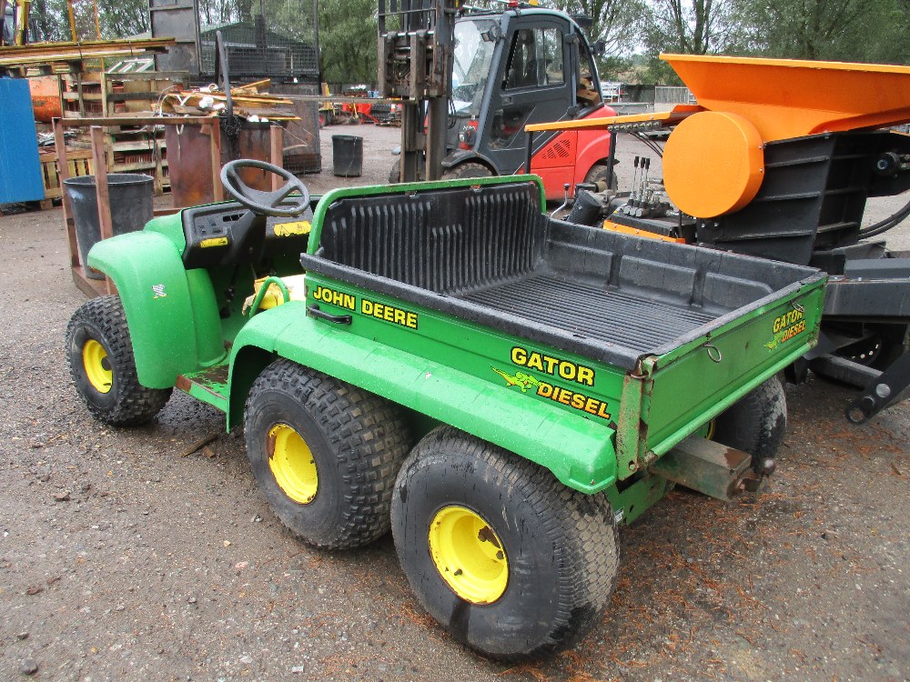 John Deere Gator 6wheel diesel powered utility vehicle. DRIVES BUT