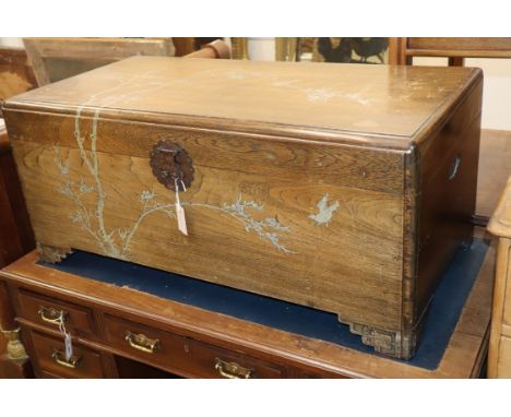 A Chinese pewter inlaid camphorwood trunk W.104cm