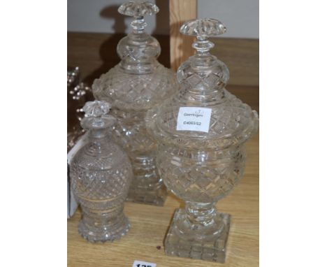 A pair of Regency style glass confitures and covers and a small Regency style decanter (3)