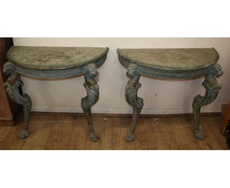 A pair of 18th century style faux verdigris demi lune console tables W.90cm