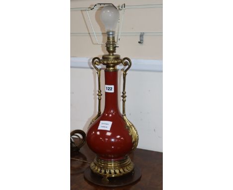 A Chinese ormolu mounted sang de boeuf vase, mounted as a table lamp height excl. fittings 38cm