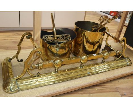 Victorian and later brass and copper, including a brass kerb, firescreen, copper coal helmet, brass coal box, kettle stand an