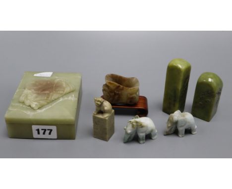 A Chinese jade vessel, three soapstone seals and other carvings