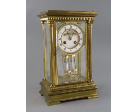 An early 20th century French ormolu four glass mantel clock, with enamelled Roman dial, visible escapement and mercury pendul
