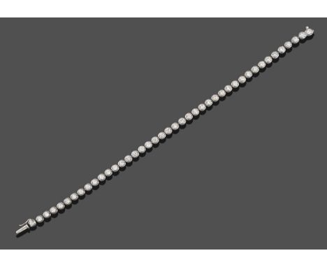 An 18 Carat White Gold Diamond Line Bracelet, round brilliant cut diamonds in claw settings and round mounts, total estimated