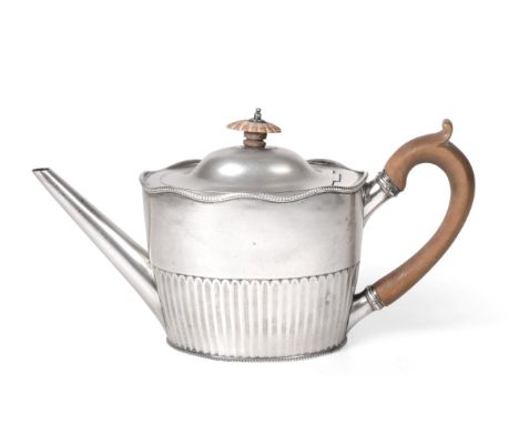 A George III Silver Teapot, by Robert Hennell, London, 1787, tapering oval and with part-fluted lower body, with shaped beade