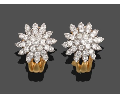 A Pair of Diamond Cluster Earrings, the cluster of round brilliant cut diamonds in white claws, total estimated diamond weigh