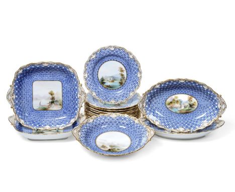A Royal Worcester Porcelain Dessert Service, painted by Harry Davis, 1902, with lakeland scenes in panels on a blue star burs