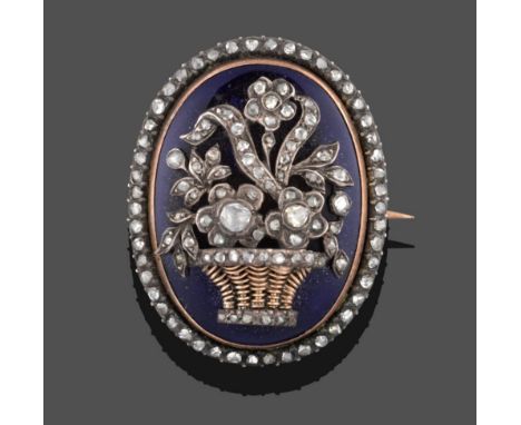 An Enamel and Diamond Brooch, circa 1850, a flower basket design inset with rose cut diamonds on an oval blue enamel panel, w